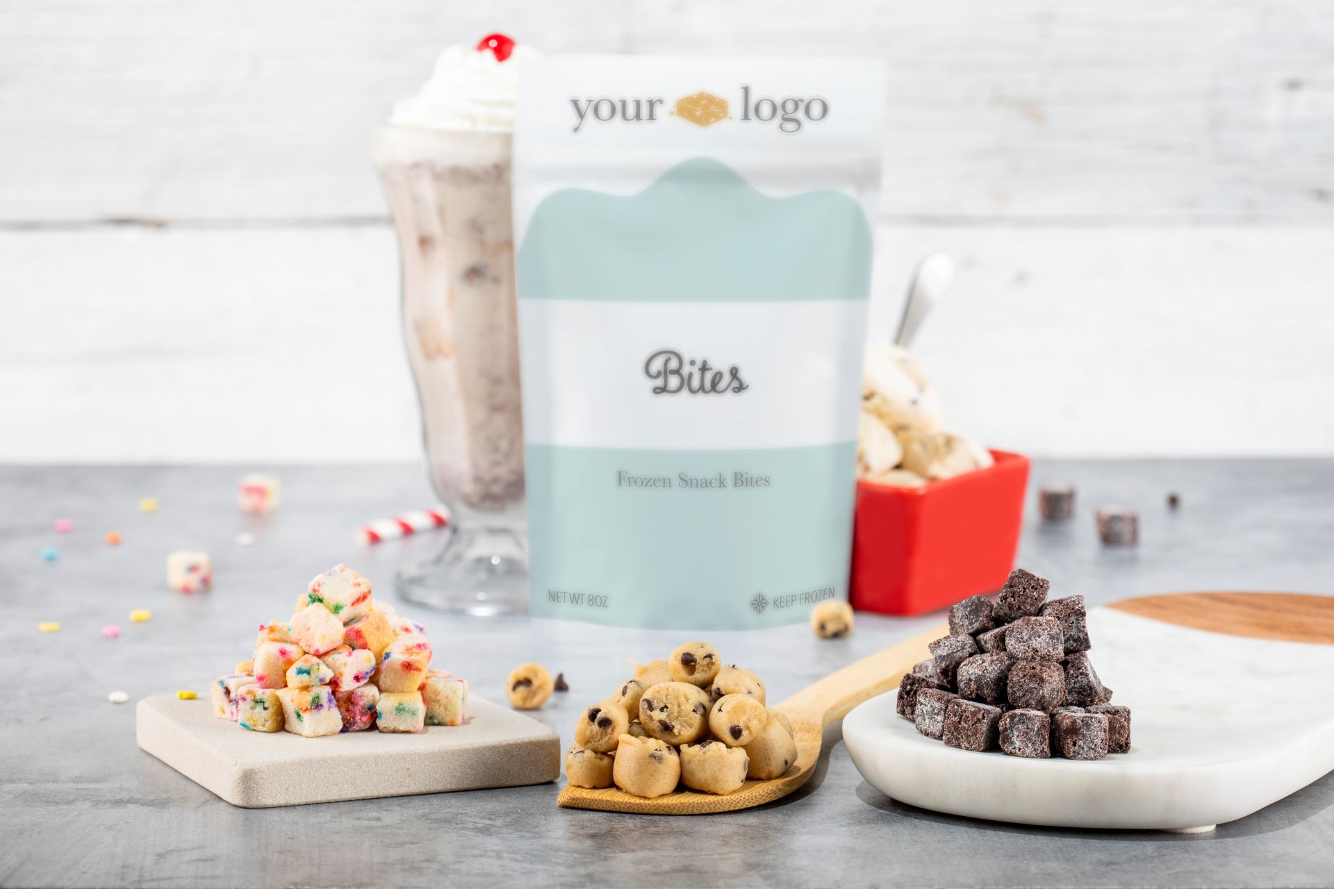 cake bites, cookie dough and brownie bites in front of milk shake, pouch and ice cream